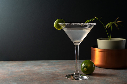 Margarita cocktail with lime in a salted rimmed glass on earthy, a Food & Drink Photo by SZ IMAGE