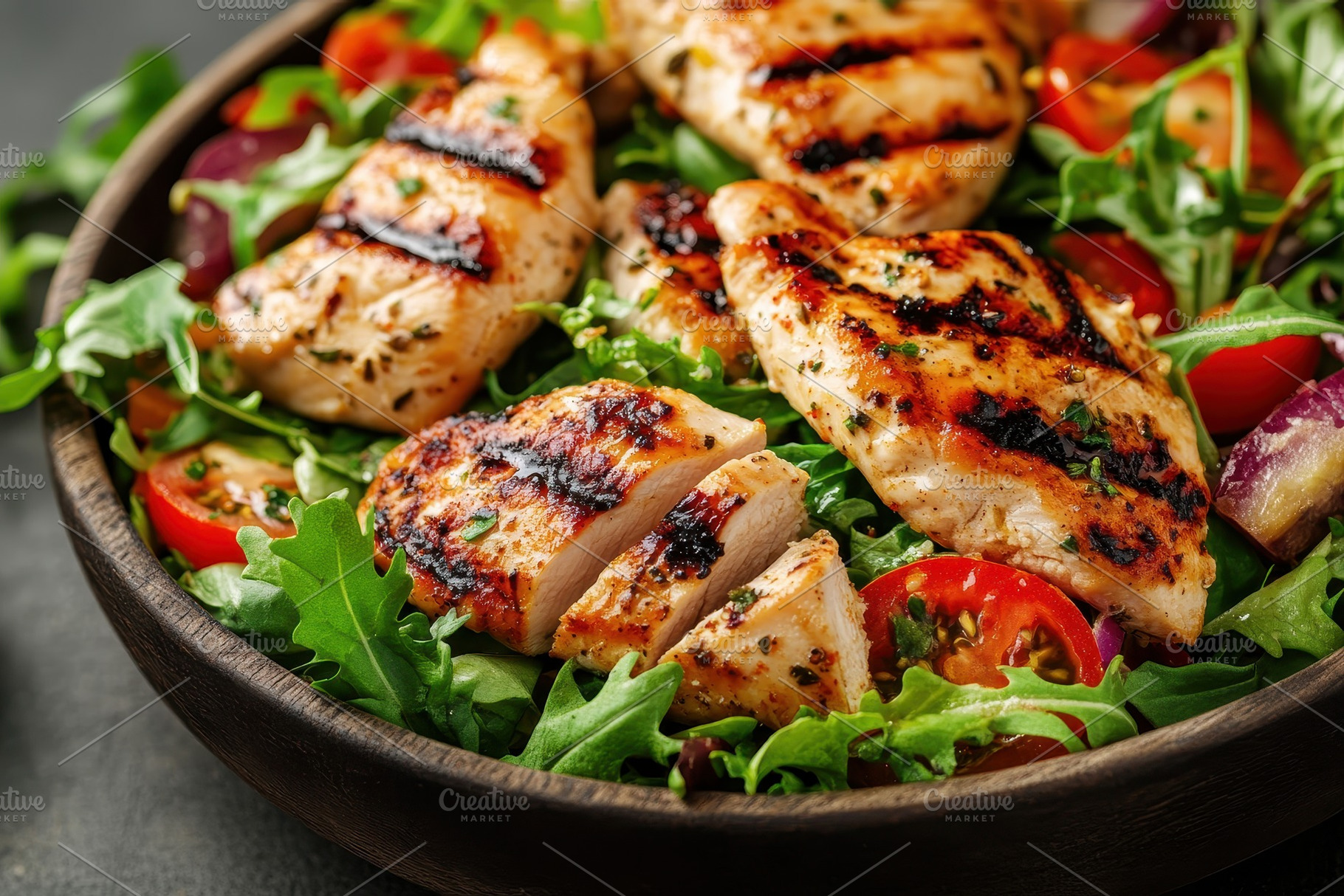 Chicken served on a fresh salad, a Photo by Pavel_design