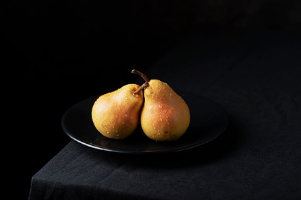Fresh sweet pears on the dark background, a Food & Drink Photo by oxana.denezhkina