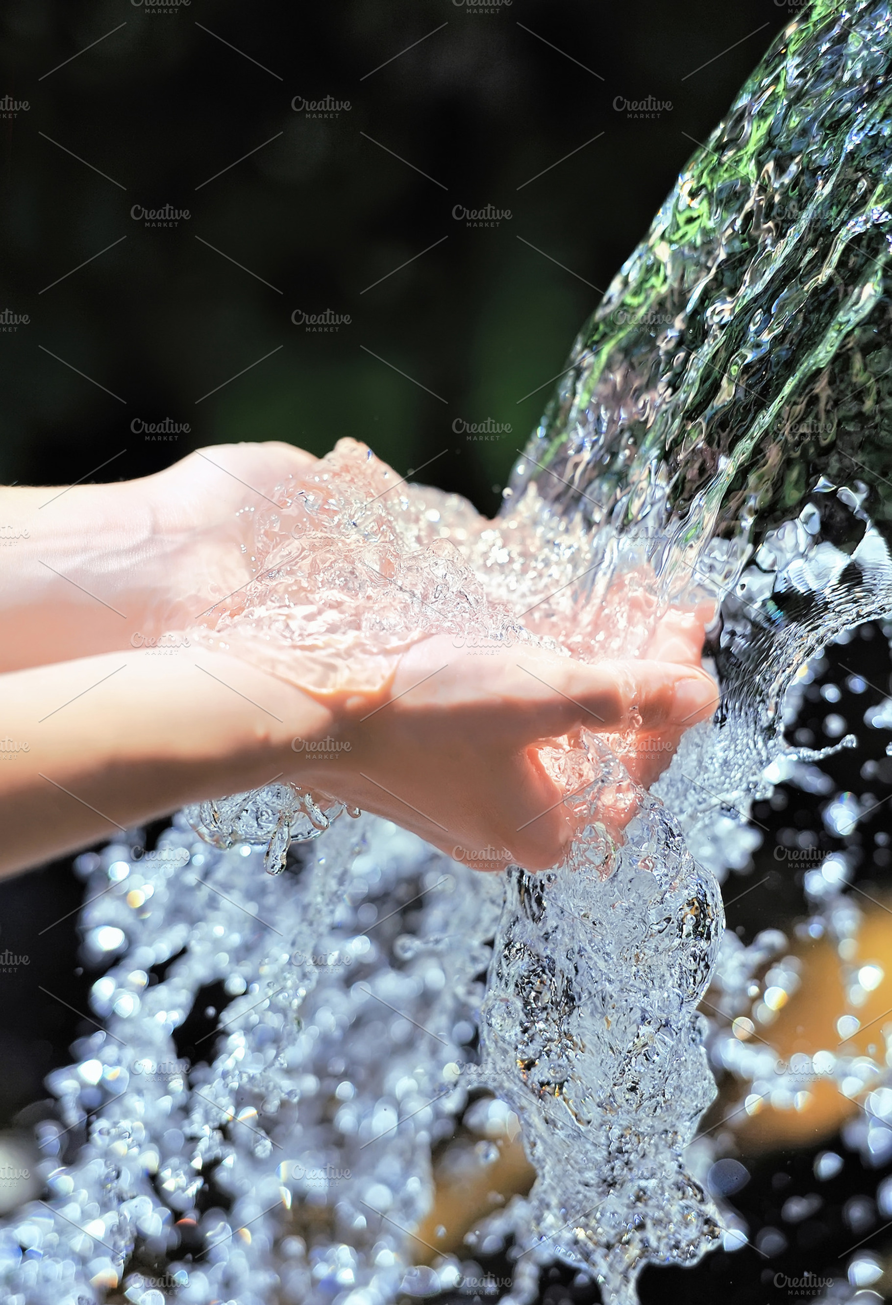Woman's hands with water splash containing water, hand, and purity, a Nature Photo by Byrdyak