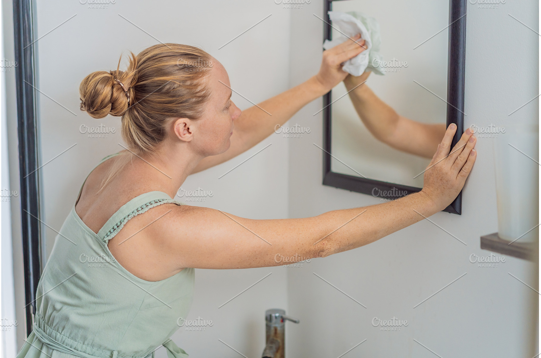 Woman cleaning her home, organizing, a Person Photo by Elizaveta Galitskaya