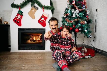 Family wearing matching Christmas pajamas, a Holiday Photo by YossSabalet