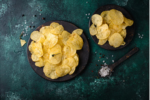 Crispy salty homemade potato chips, a Food & Drink Photo by Yulia Furman