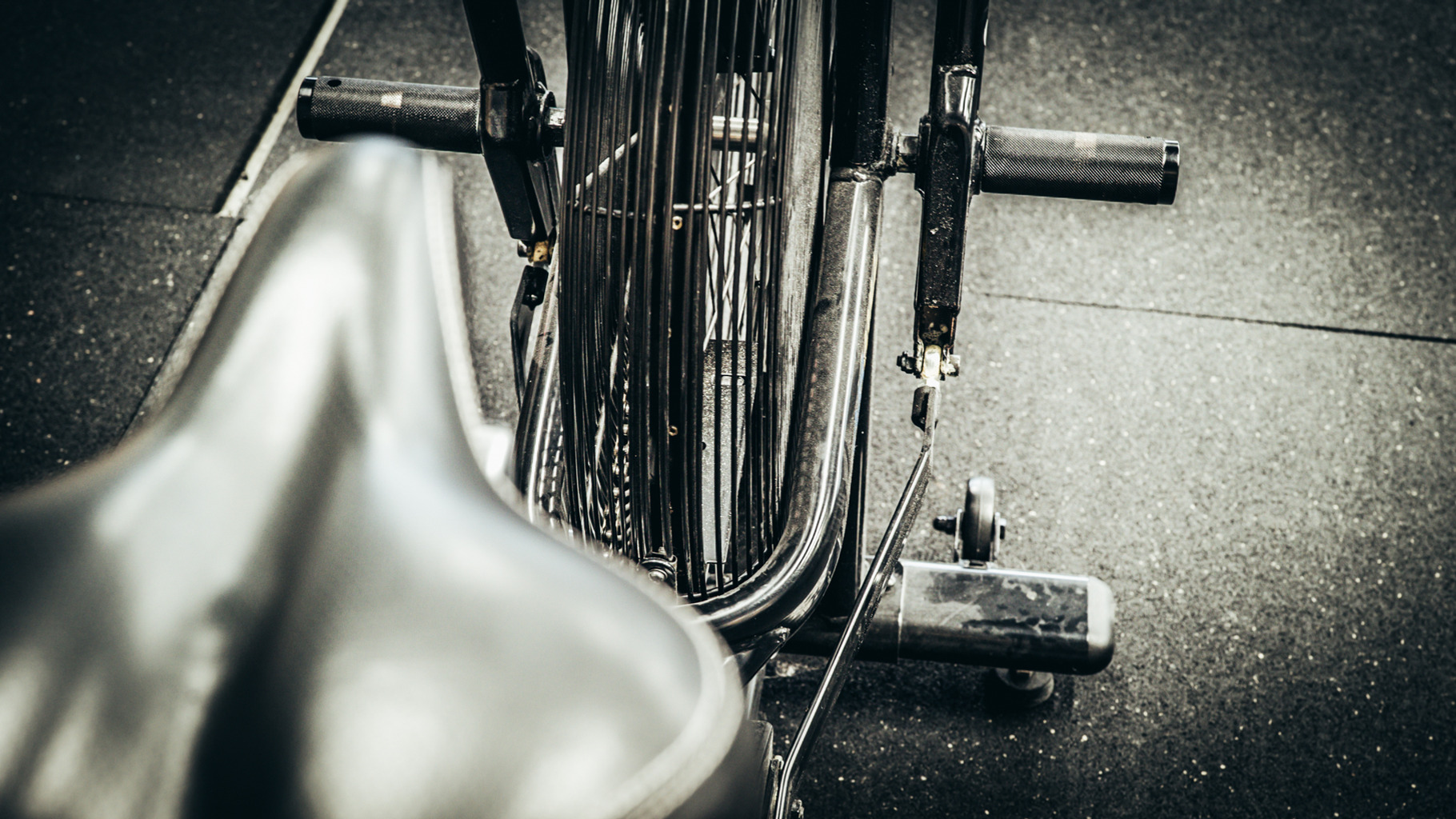 Air bike machine at a crossfit gym containing fitness, weights, and muscle, a Sports & Recreation Photo by Snake Eye Media