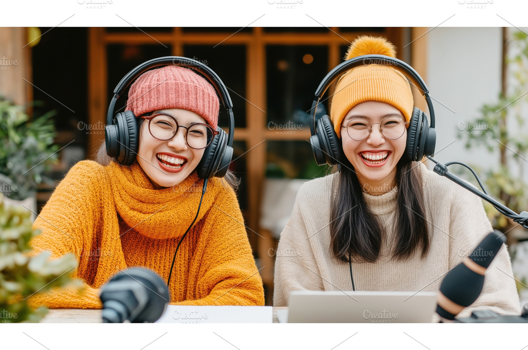 Two Asian female podcast hosts in, a Technology Photo by Sergey Kotenev