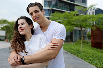 Man and woman couple smiling confident hugging each other at street, a Person Photo by RF Images