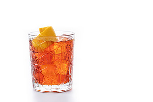 Americano cocktail garnished with twist orange isolted on white background, a Food & Drink Photo by etorres69