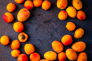 Ripe apricots on dark background, a Food & Drink Photo by Yulia Furman
