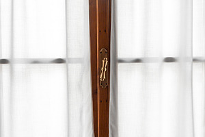 Window frame with retro handle, an Architecture Photo by BOOCYS