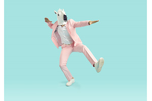 Funny man in horse mask and pink, a Person Photo by StudioRomantic