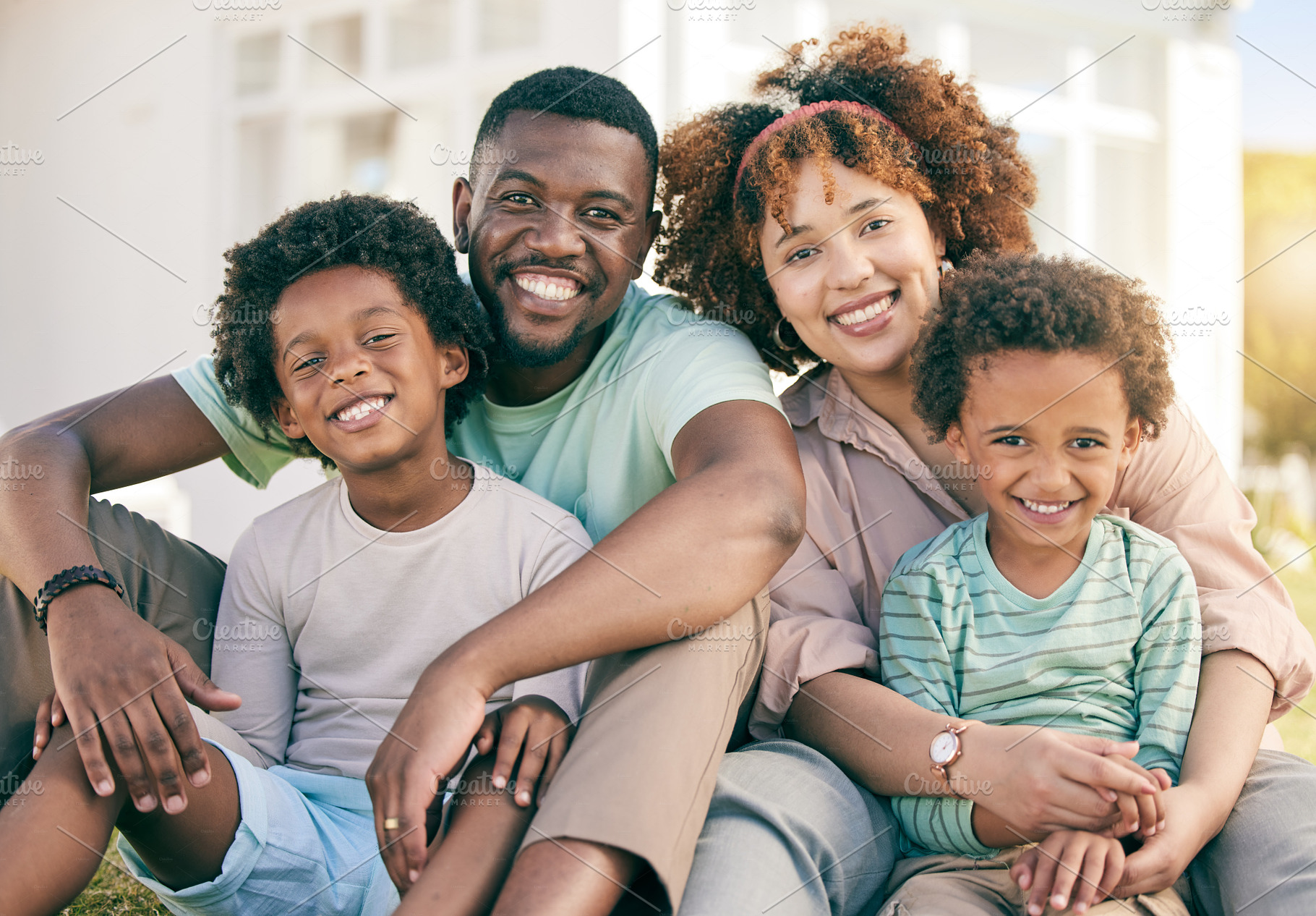 Portrait, love and black family outdoor, quality time and happiness with joy, cheerful and bonding together. Face, parents and mother with father, children or kids with smile, relax or loving outside, a Photo by Peopleimages.com