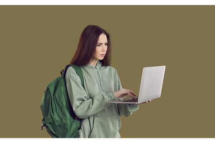 Focused smart girl student with, a School & Education Photo by StudioRomantic
