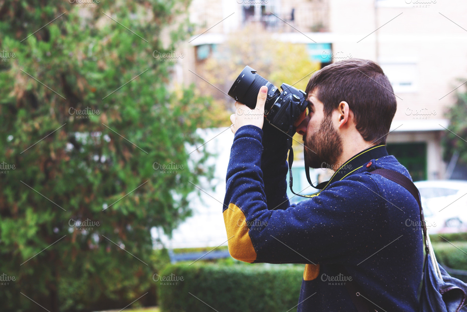 Photographer containing photographer, camera, and shoot, a Person Photo by Iván Noguera Photography