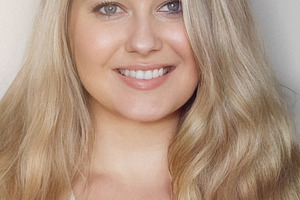 Blonde woman smiling, portrait showing beauty, happiness, and na, a Person Photo by Studio ANNA