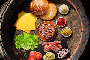 Cheeseburger ingredients on barrel, a Food & Drink Photo by Volff