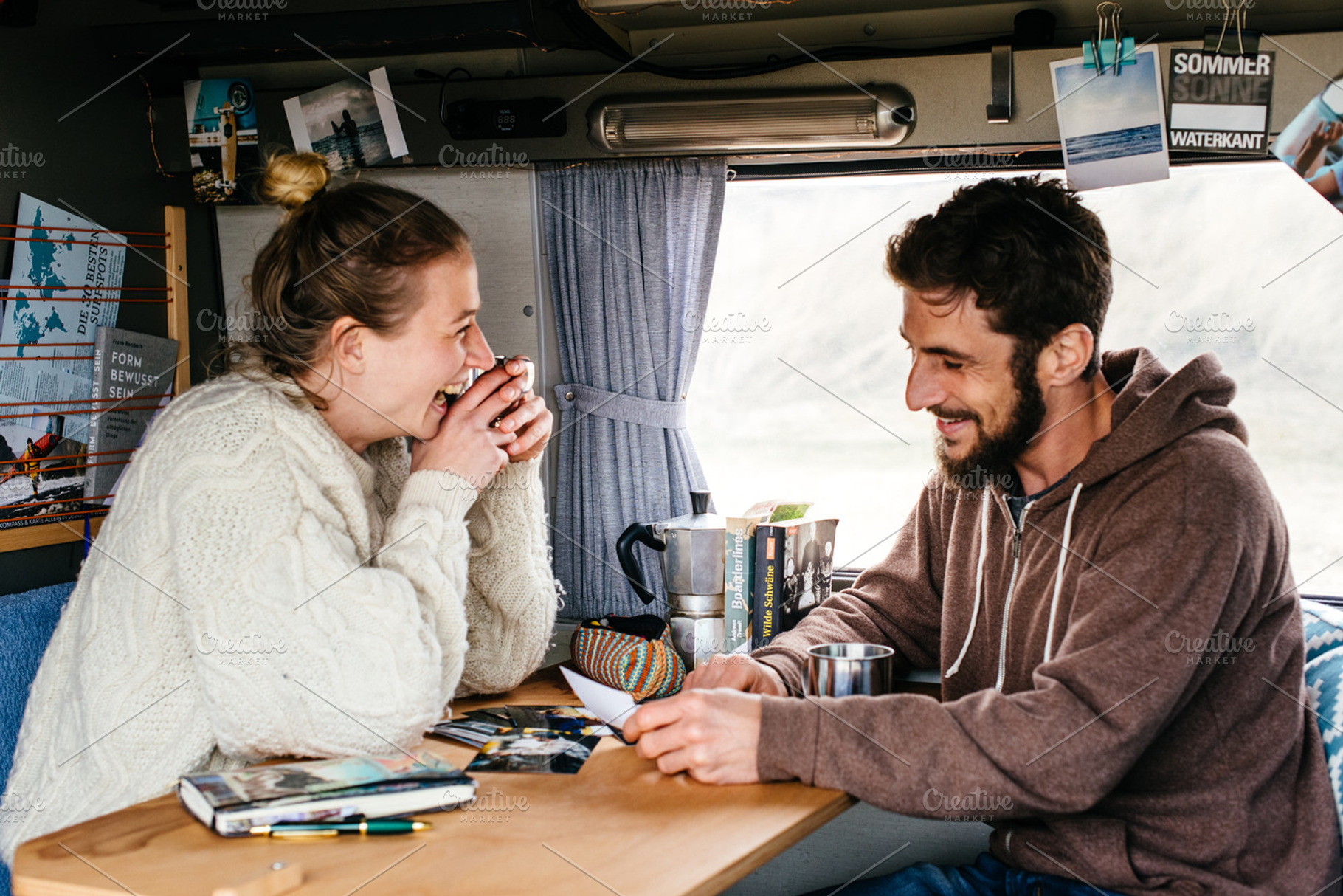 Couple relaxing in a camper van stock photo containing outdoor and sport, a Person Photo by Authentic Outdoor Photos