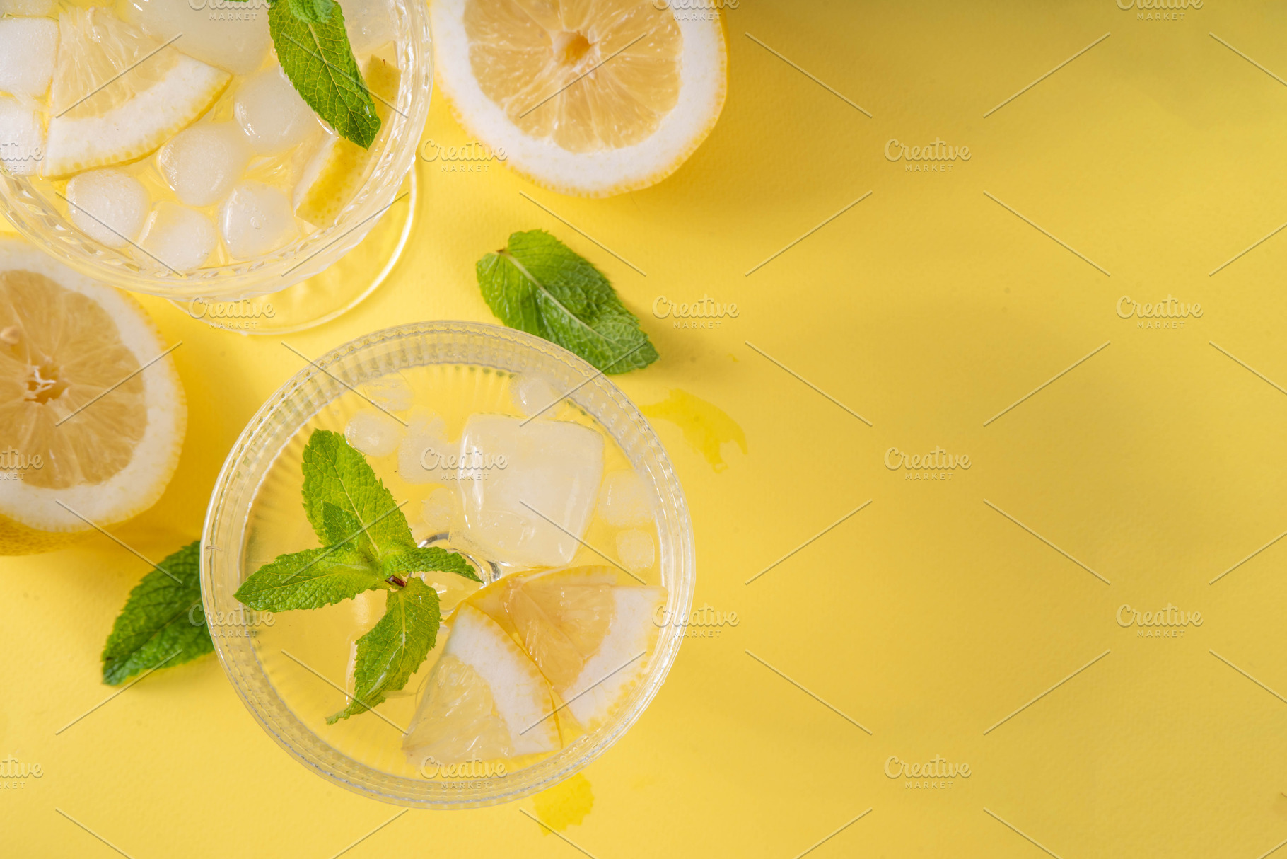 Lemon Drop Martini, cold sweet and sour lemonade cocktail, a Food & Drink Photo by Rimma