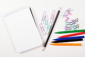 Crayons and stationery back to school concept mockup featuring school, back