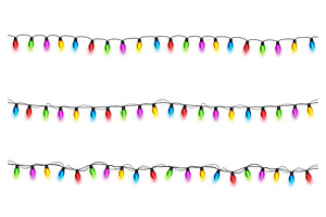 Christmas Glowing Lights On White Background. Garlands With Colored Bulbs. Xmas Holidays. Christmas Greeting Card Design Element. New Year,winter.