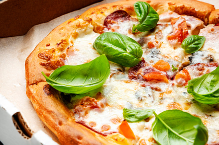 Hot pizza in box with spicy salami sausage, mozzarella cheese, t, a Food & Drink Photo by 5PH