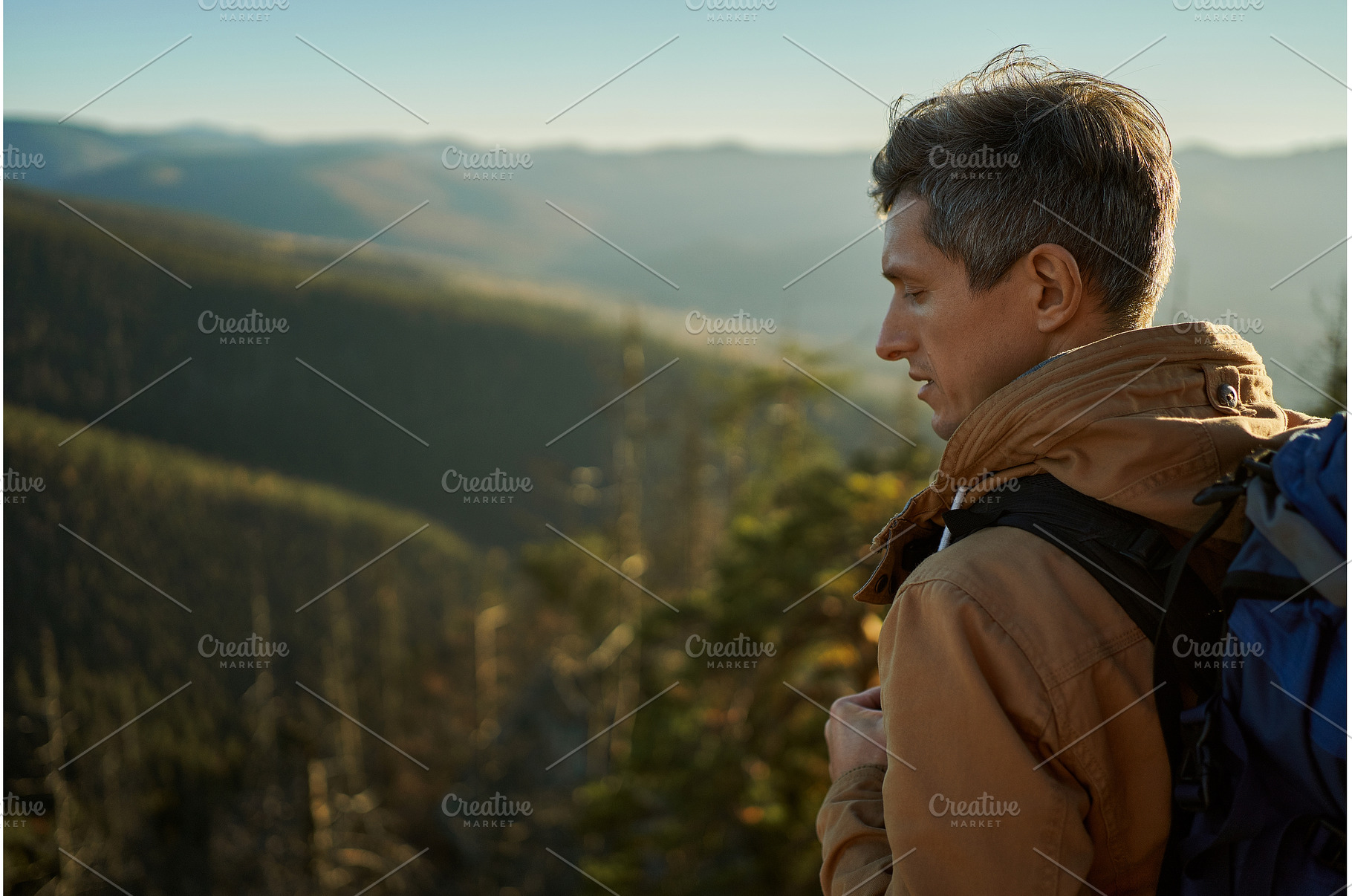 Portrait man traveler with backpack, a Nature Photo by vitaliymateha photography