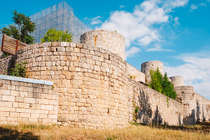 walls and towers of Burgos Castle with metal frame, a Photo by Nito