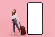 Female Tourist Near Phone Screen Posing With Suitcase, Pink Background, a Photo by Prostock-Studio (Thumbnail 1 of 4)