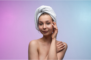 Young woman with a towel on her head, a Person Photo by volodymyrshtun13795