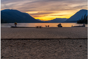 People relaxing on Lake Wenatchee, a Nature Photo by Backyard Stock