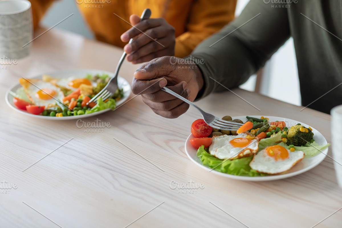 Healthy Breakfast. Black Man And Woman Eating Tasty Food In Kitchen, a Photo by Prostock-Studio (Photo 2 of 3)