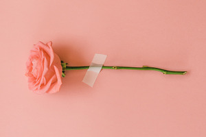 Rose quartz containing scotch tape, aerial, and background