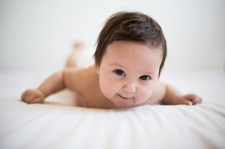 Smiling Baby Girl - tummy time