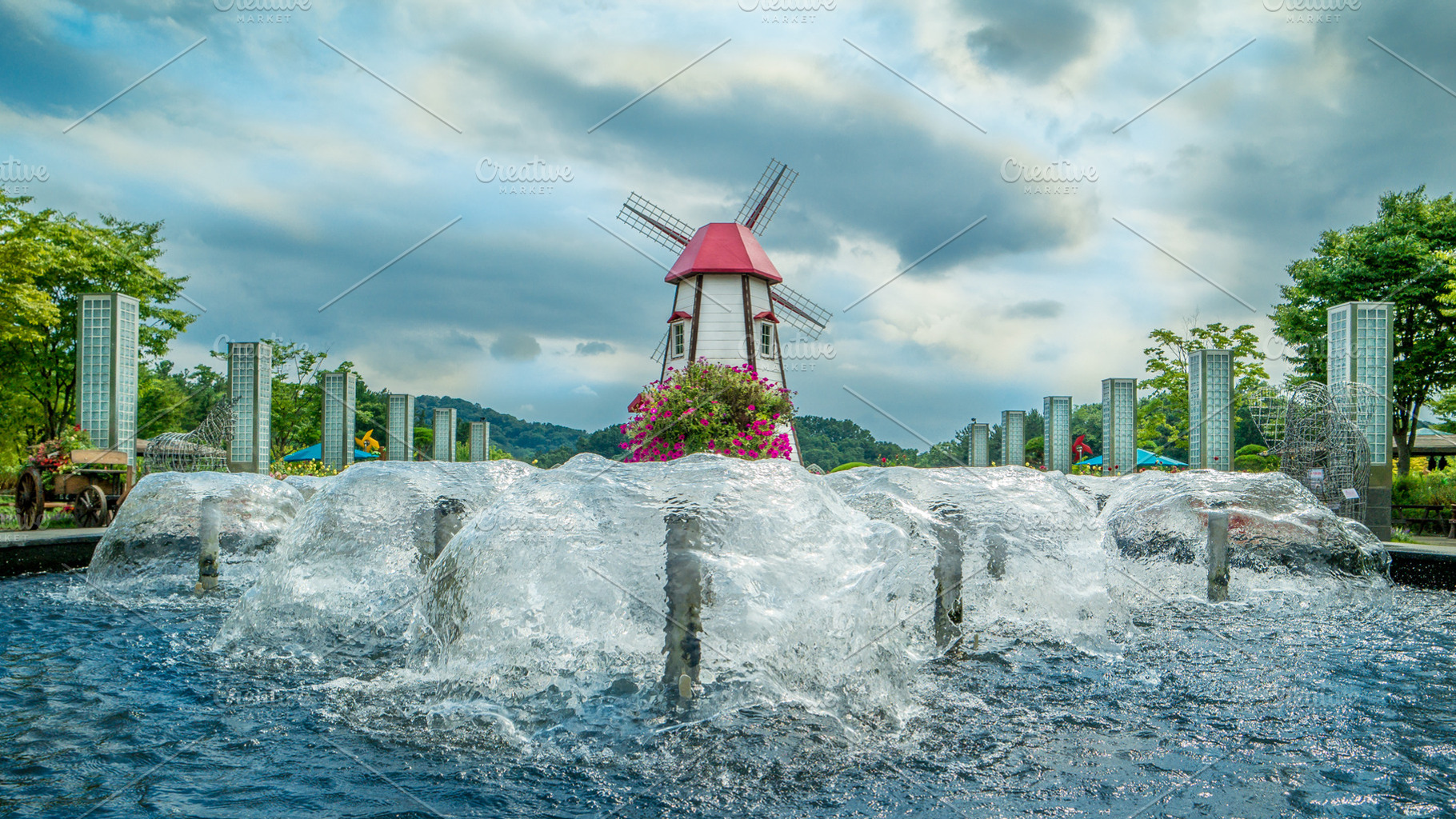 Street park with fountain and windmill in Daejeon South Korea, horizontal, a Nature Photo by iuliia_n
