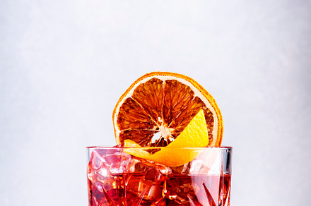 Negroni alcoholic cocktail drink with dry gin, red vermouth and, a Food & Drink Photo by 5PH
