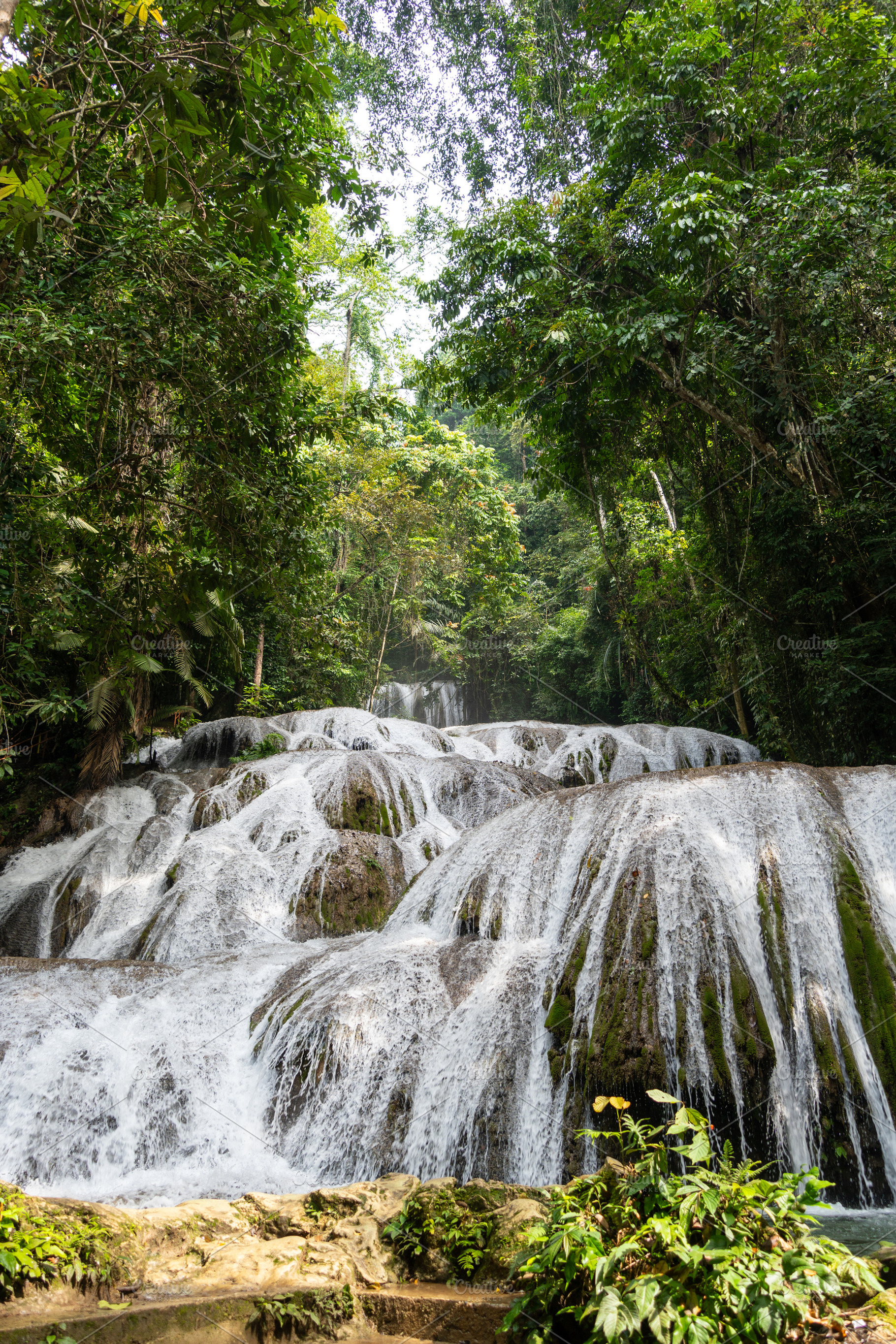 Saluopa waterfall in the tropical forest of Tentena, Sulawesi, I, a Nature Photo by GoodGoods