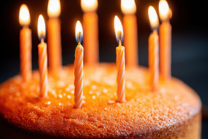Colorful birthday cake with candles and sprinkles, a Food & Drink Photo by AlyaAnd