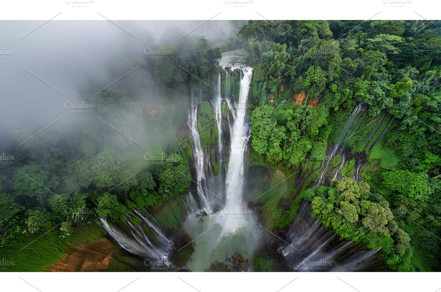 Tall aerial waterfall surrounded by, a Nature Photo by Igor Tichonow