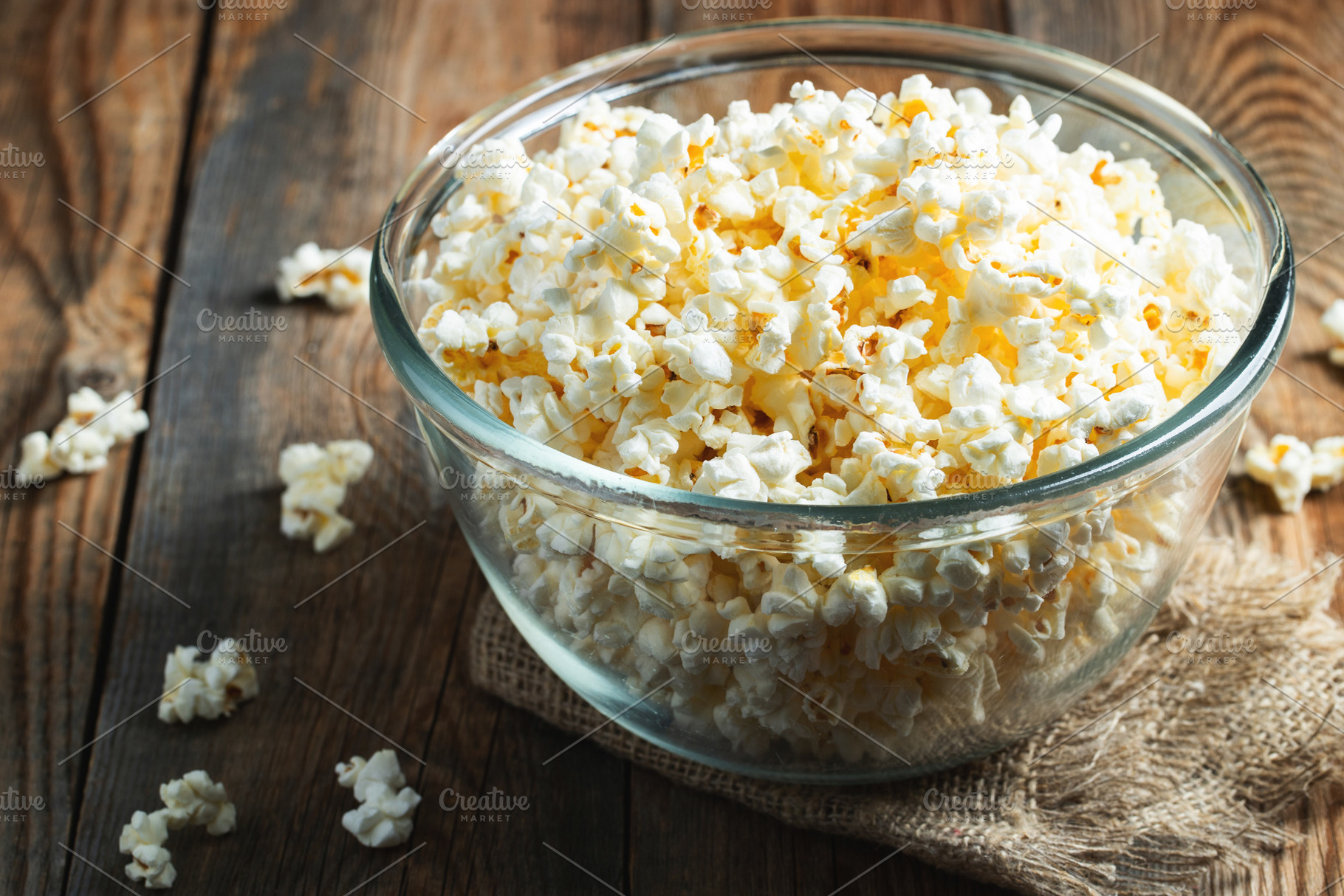 Popcorn on wood color background.Food and snack concepts ideas.Minimal style to, a Food & Drink Photo by Budarinphoto