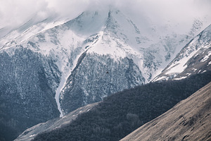 Misty rocky mountain containing landscape, nature, and mountain