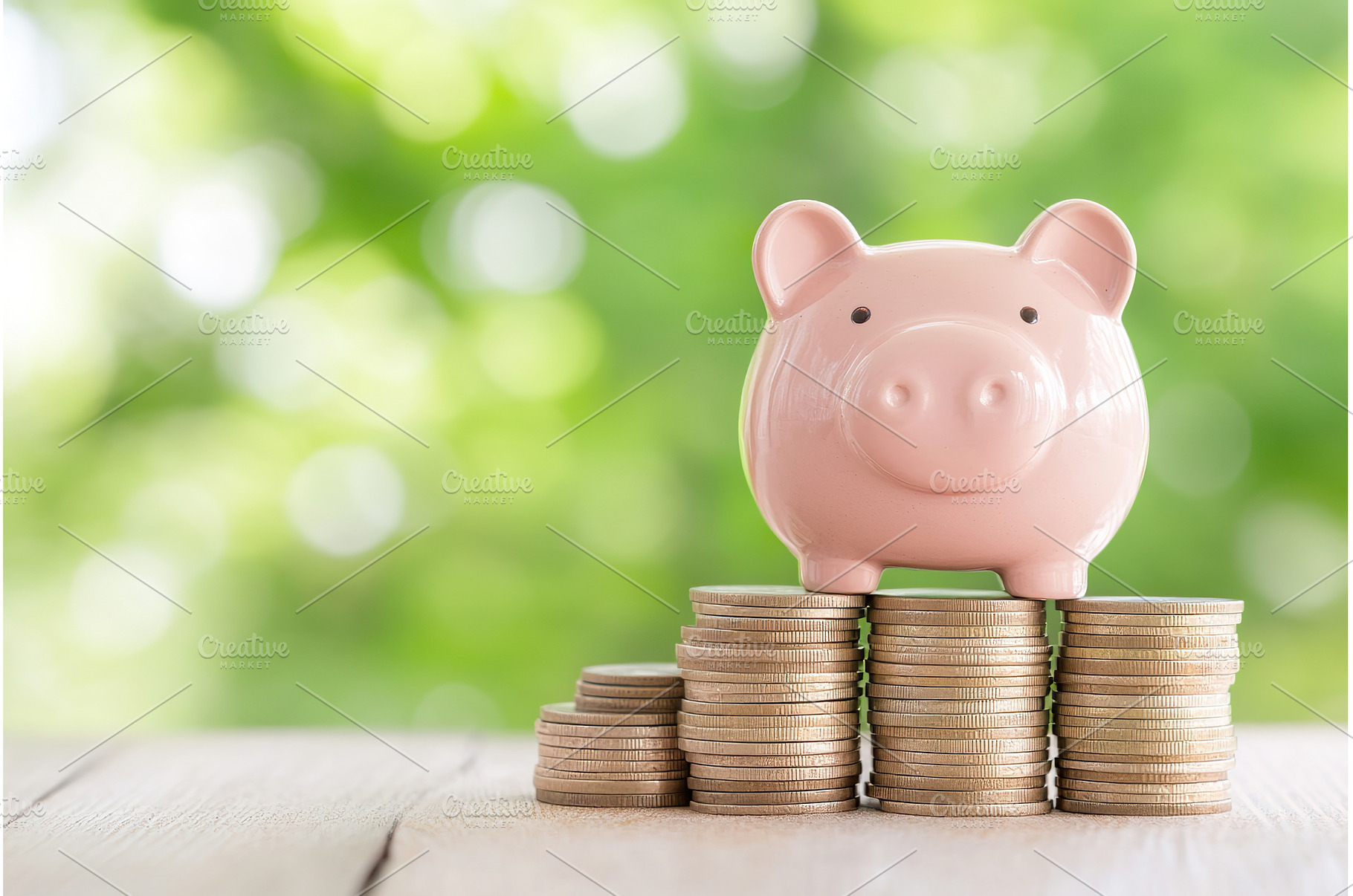 Pink Piggy Bank Balanced on Gold, a Business Photo by Lermont51