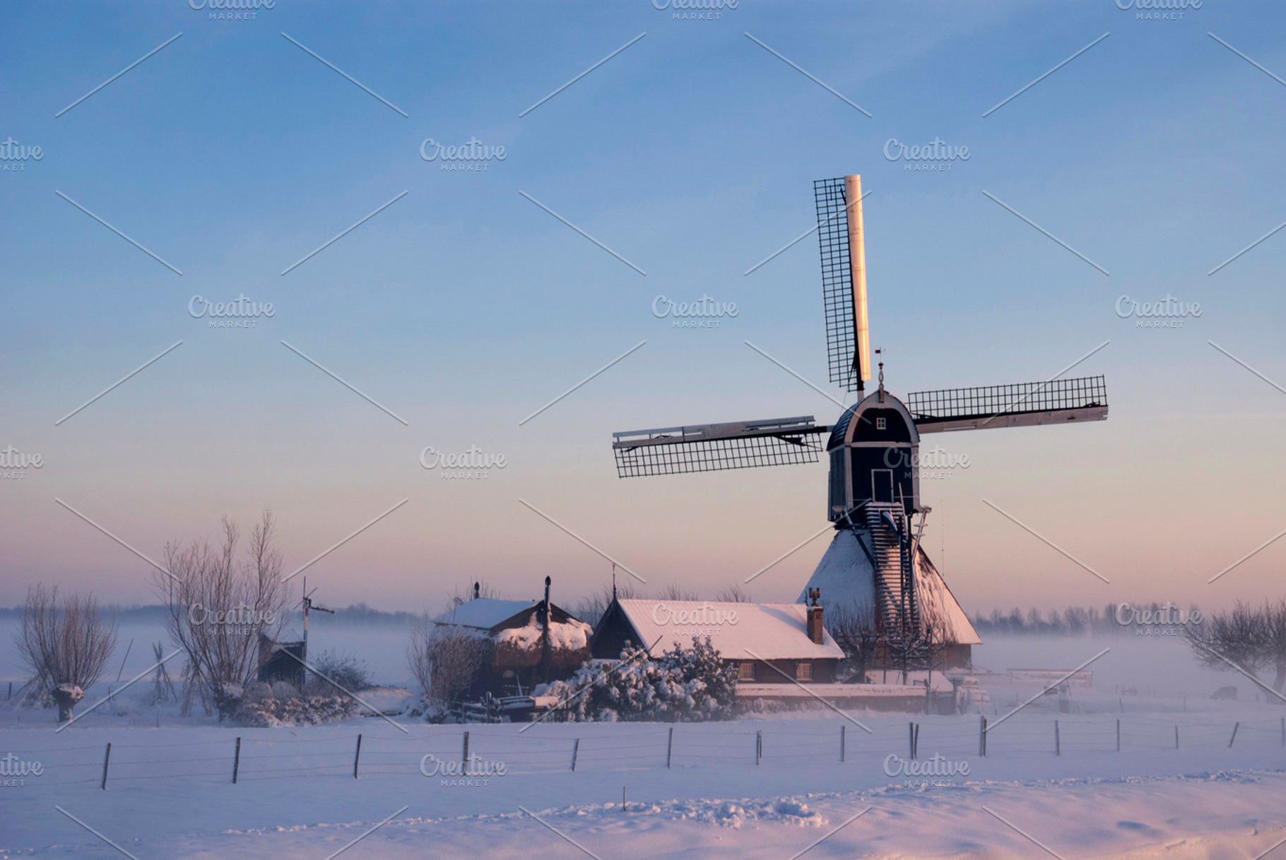 Wingerdse mill in wintermood stock photo containing cold and gate, a Holiday Photo by John Stuij Photography
