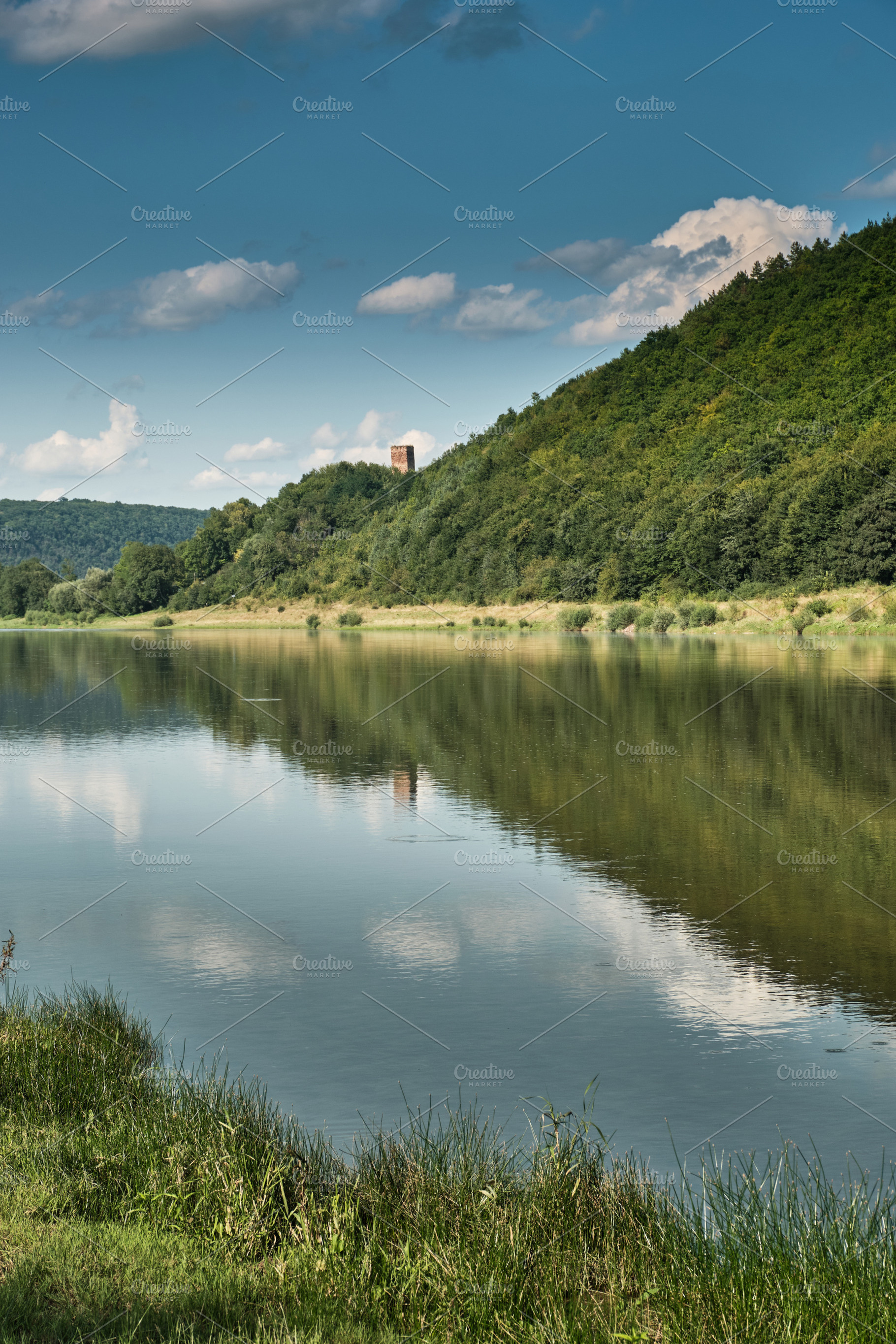 Scenic landscape with Chervonohorod castle tower on a hill above Dniester river, a Nature Photo by Rohan Photography