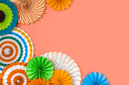 Colorful paper rosette and birthday garlands. Decorating for a p, a Beauty & Fashion Photo by Natalia Kostikova