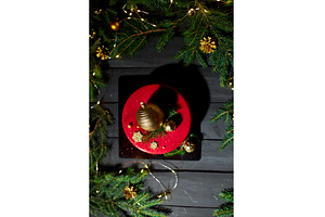 Festive Red Cake Adorned With Golden, a Holiday Photo by IlliaBondarPhotography