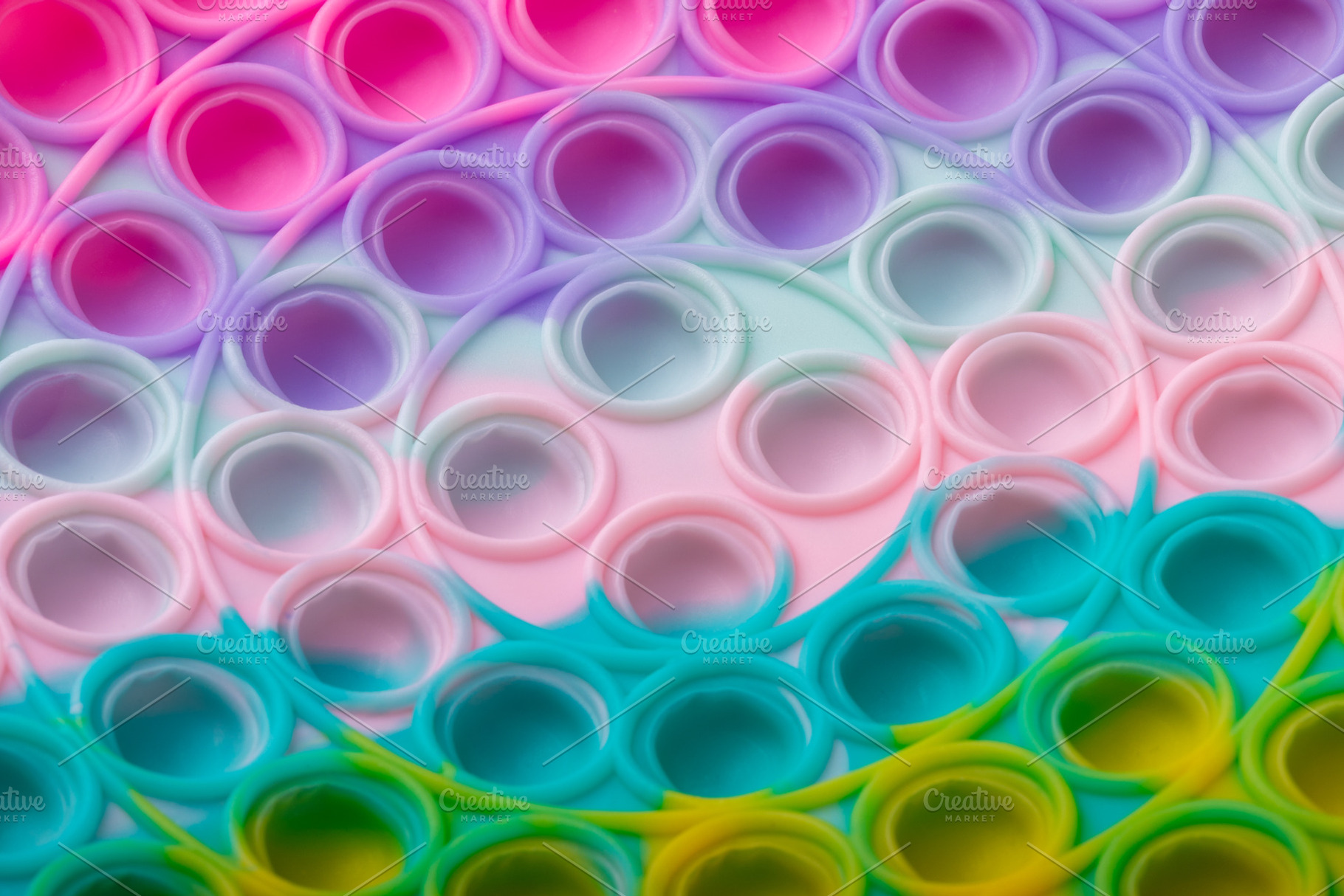 Colorful Pop It Fidget Toy Close-Up, a Background Photo by Ales Munt