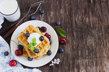 Freshly baked sweet waffles featuring waffle, sweet, and dessert