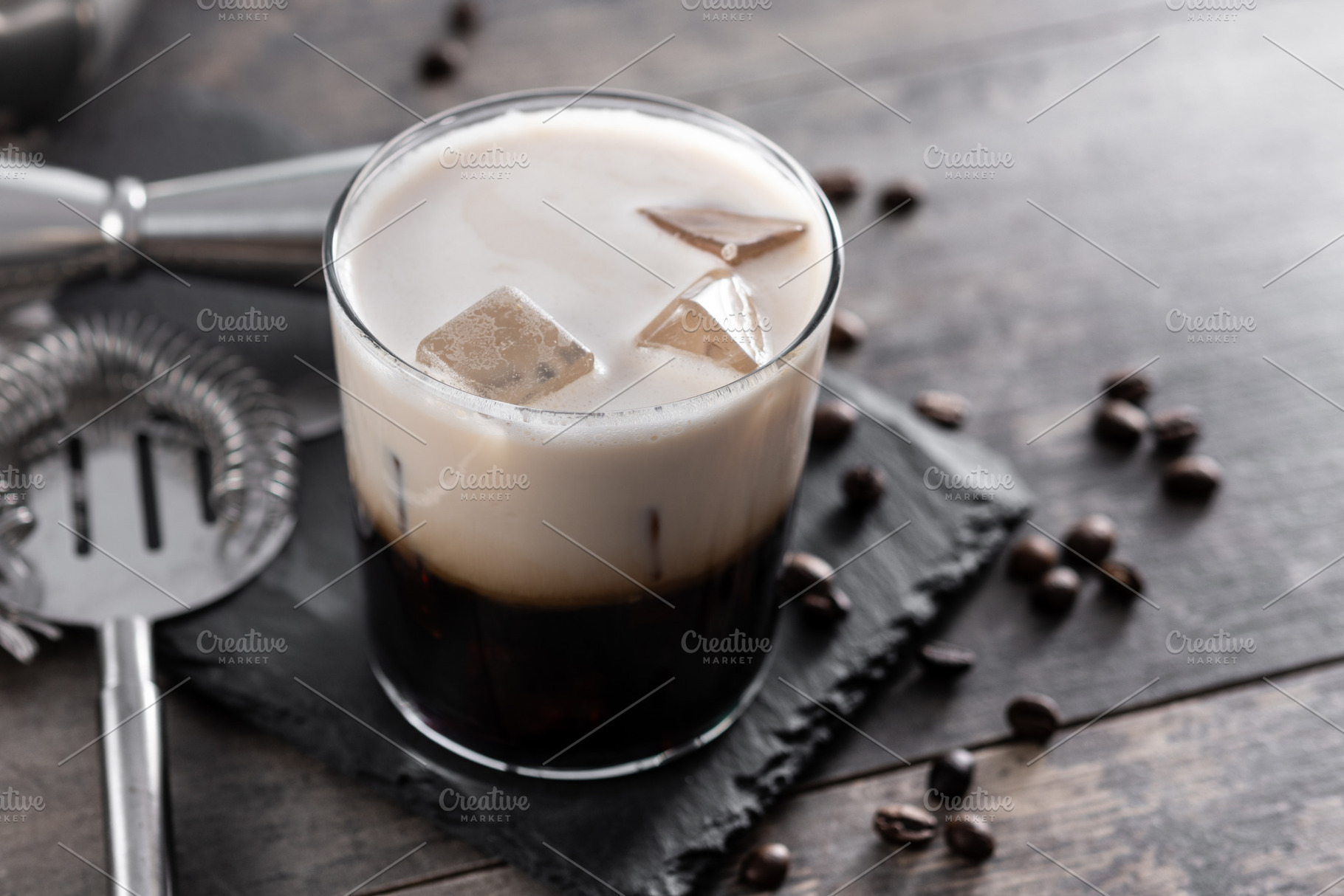 Refreshing Boozy White Russian Cocktail with Vodka and Cream, a Food & Drink Photo by etorres69