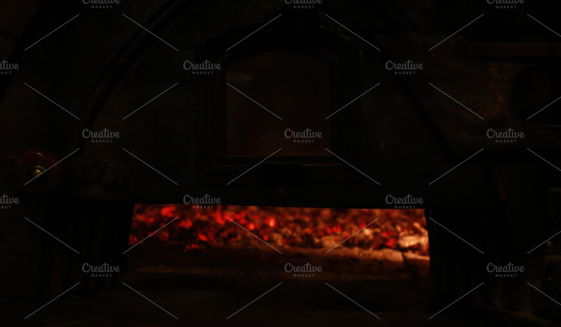 Embers glowing in an old wood-fired oven, creating a warm and inviting atmosphe, an Abstract Photo by Antonio Gravante Market