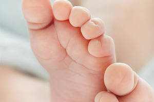 Newborn baby's feet containing baby, foot, and human