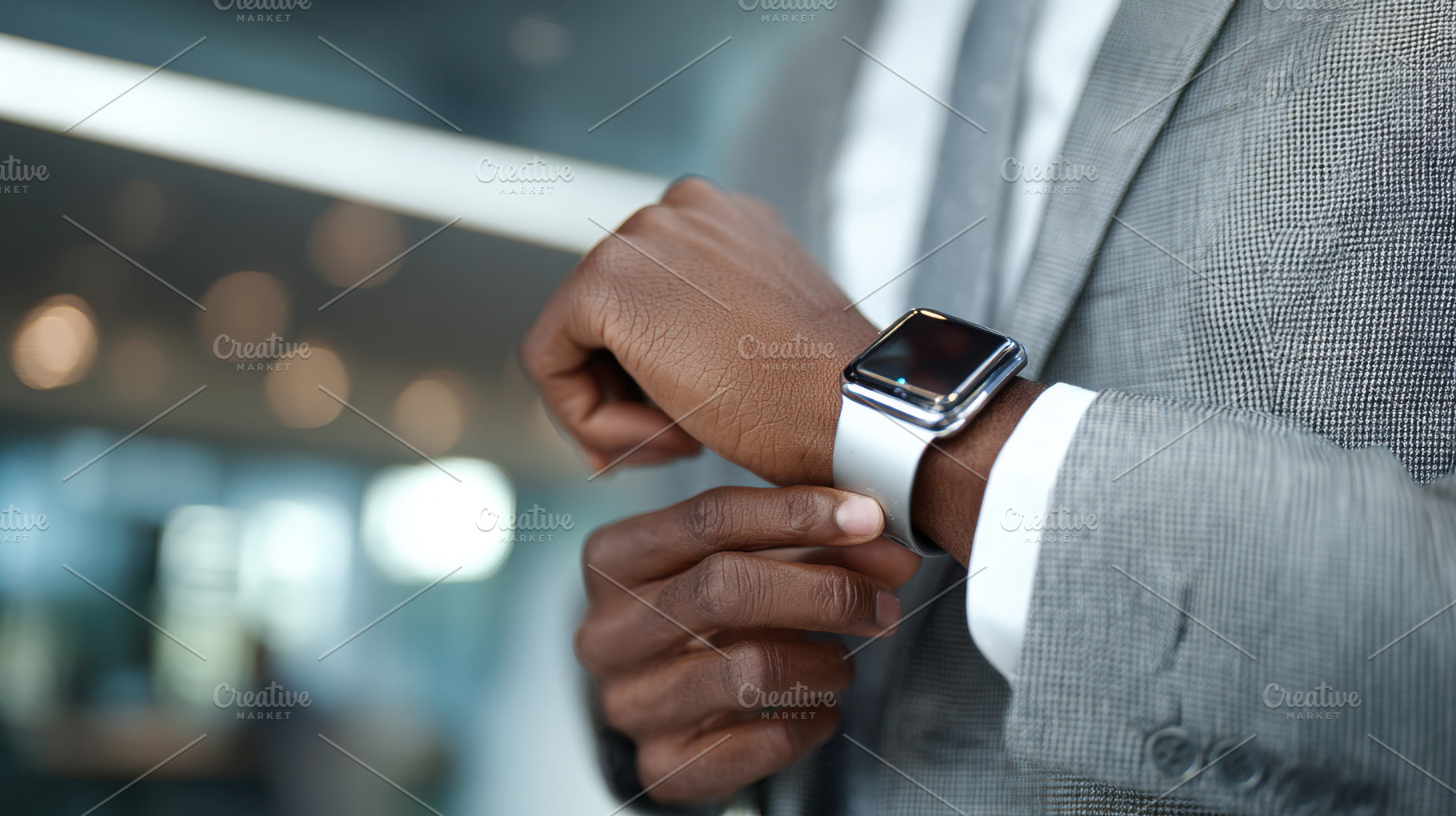 Man checks time on smartwatch, a Photo by Beautiful things
